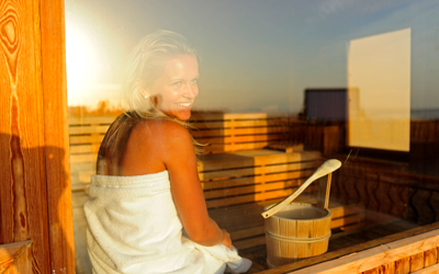 Relaxing in the sauna with a sea view at The Breakers Somabay.